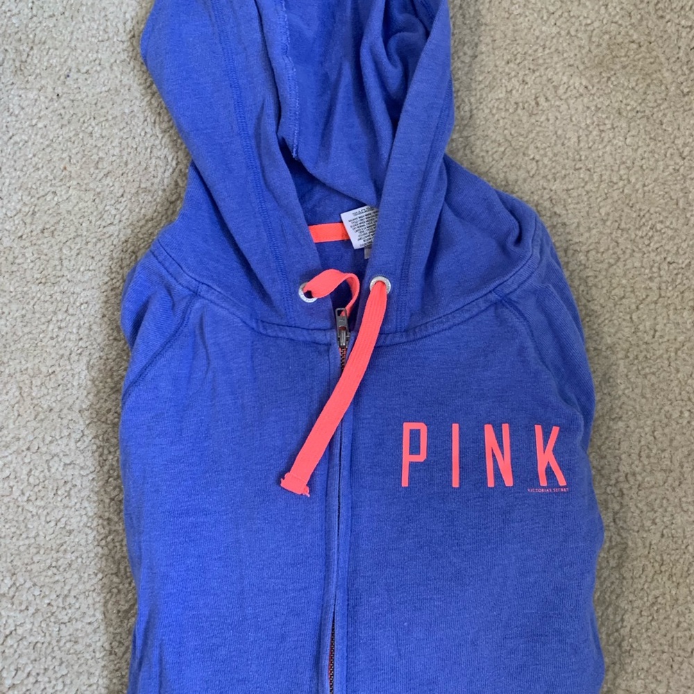 PINK zip up jacket.